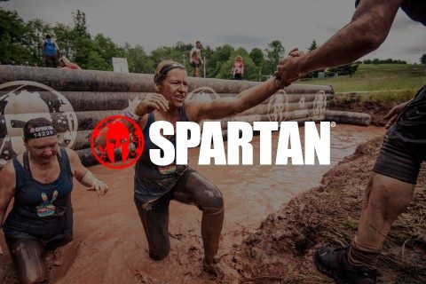 Woman outside in a Spartan Race fundraiser for the Red Cross.